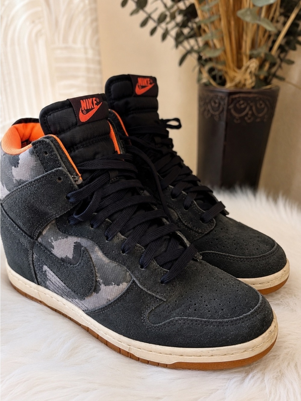 Nike Women’s High-Top Sneakers in Black with Orange Accents and Camo Panels